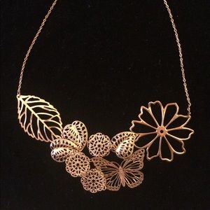Gold flower and butterfly bib necklace